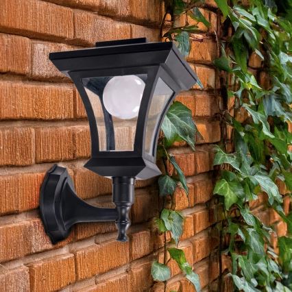 Aurinkokennolla toimiva LED-seinävalaisin TIRANA LED/1,2V 1800 mAh IP44 musta