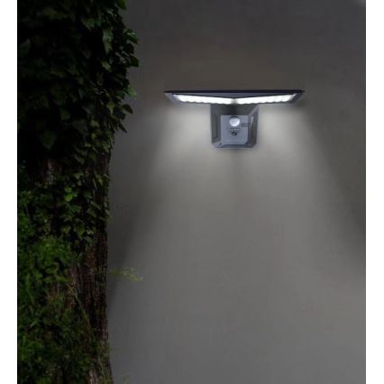LED-seinäaurinkovalaisin anturilla LED/2,6W/5,5V IP65 musta
