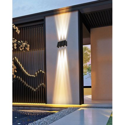 LED aurinkokenno seinävalaisin anturilla LED/2W/5V IP54