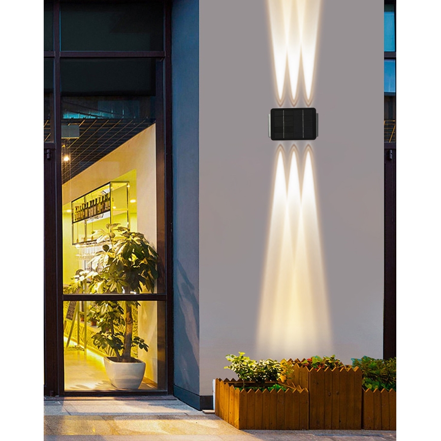 LED aurinkokenno seinävalaisin anturilla LED/2W/5V IP54