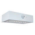 LED-seinäaurinkovalaisin anturilla LED/3W/3,7V 3000K/4000K IP65 valkoinen