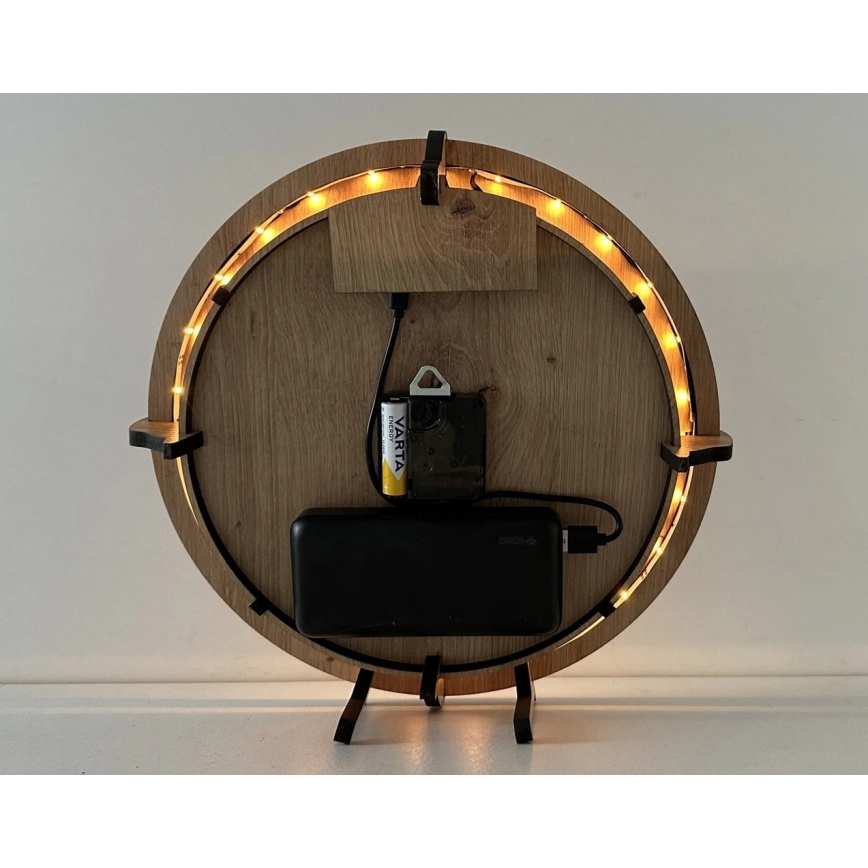 Li-Go 23688/DUB2 - LED-himmennettävä seinäkello liiketunnistimella LED/5V 20000 mAh + 1xAA halkaisija 32 cm tammi/voikukka