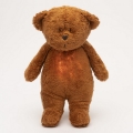Moonie - Snuggle buddy melodialla ja valolla pieni karhu 2.0 organic caramel
