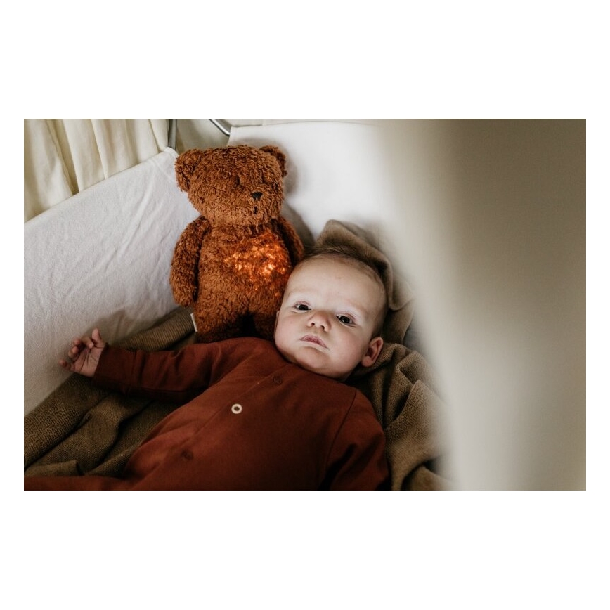 Moonie - Snuggle buddy melodialla ja valolla pieni karhu 2.0 organic caramel