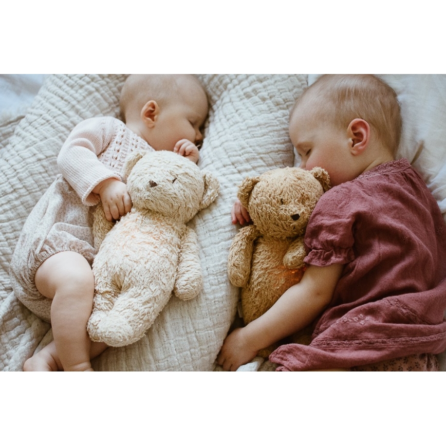 Moonie - Snuggle buddy melodialla ja valolla pieni karhu 2.0 organic hunajanauhat