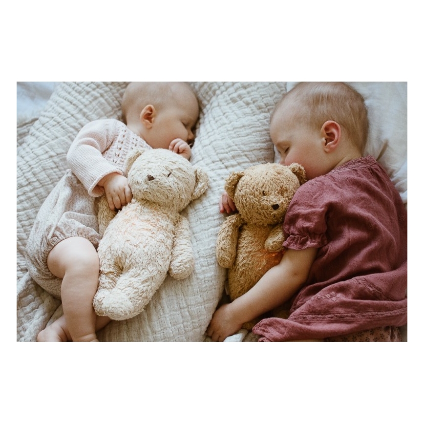Moonie - Snuggle buddy melodialla ja valolla pieni karhu organic hunajanauhat natur
