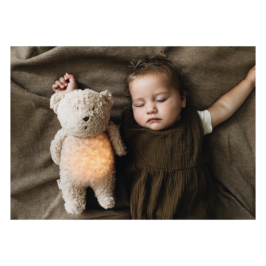Moonie - Snuggle buddy melodialla ja valolla pieni karhu organic hunajanauhat natur