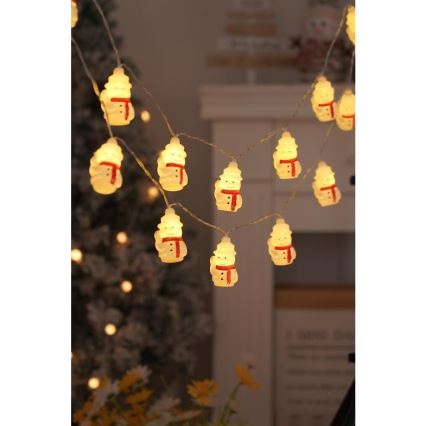 LED-jouluketju 20xLED/3xAA/lämpimänvalkoinen 3,3m lumiukkoja