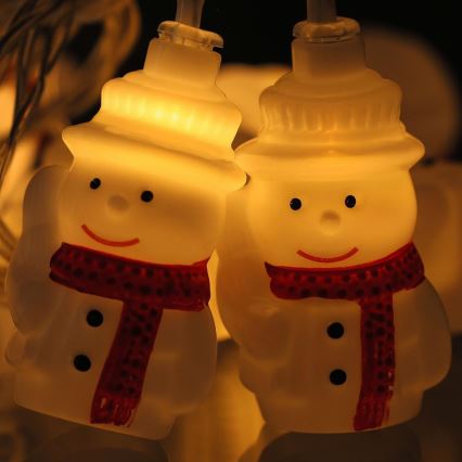 LED-jouluketju 20xLED/3xAA/lämpimänvalkoinen 3,3m lumiukkoja