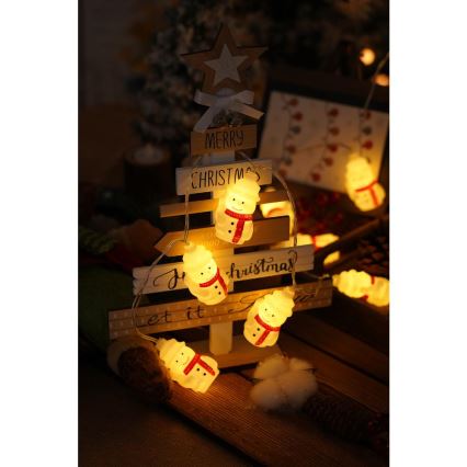 LED-jouluketju 20xLED/3xAA/lämpimänvalkoinen 3,3m lumiukkoja