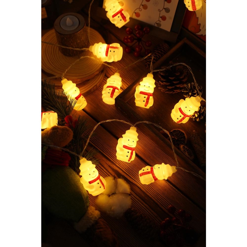 LED-jouluketju 20xLED/3xAA/lämpimänvalkoinen 3,3m lumiukkoja