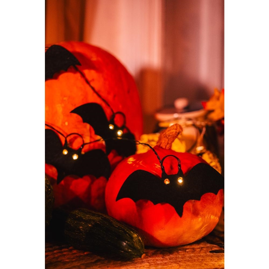 LED-koristeketju HALLOWEEN 10xLED/2xAA/lämpimänvalkoinen 1,3m lepakoita