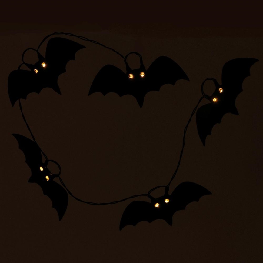 LED-koristeketju HALLOWEEN 10xLED/2xAA/lämpimänvalkoinen 1,3m lepakoita