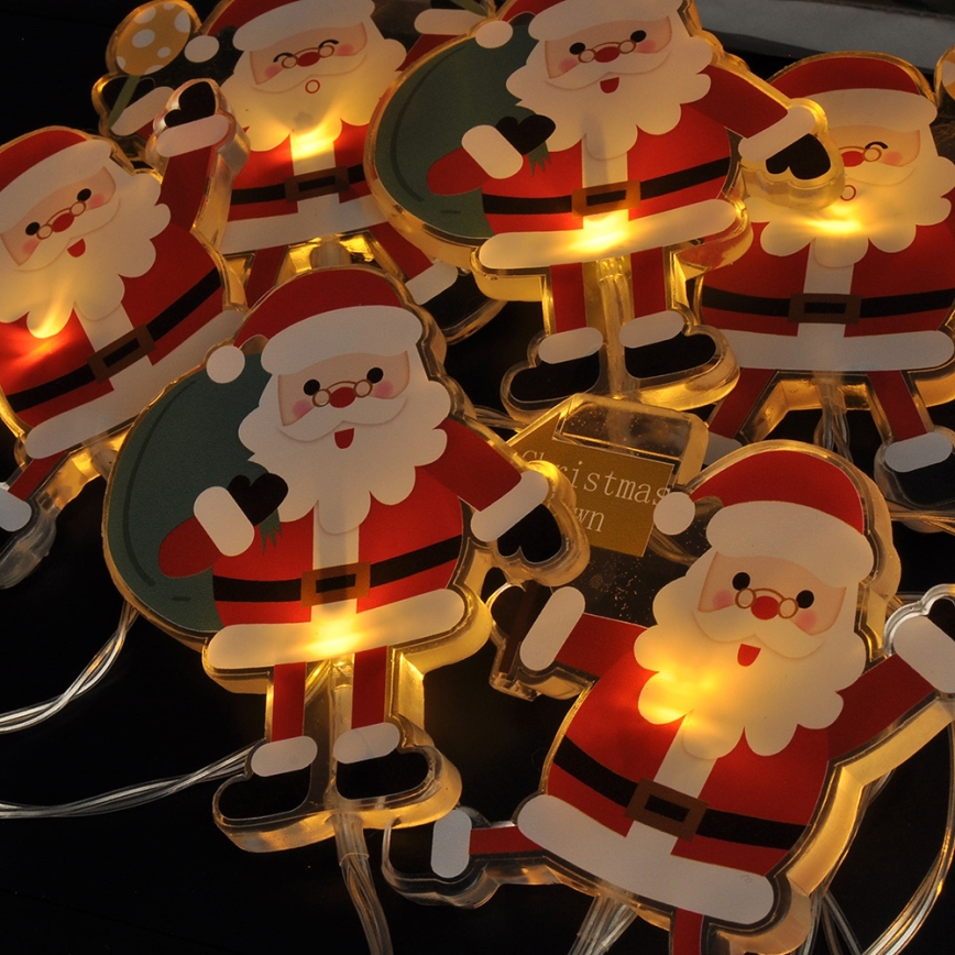 LED jouluketju imukupeilla 6xLED/2xAA 1,2m lämmin valkoinen joulupukki