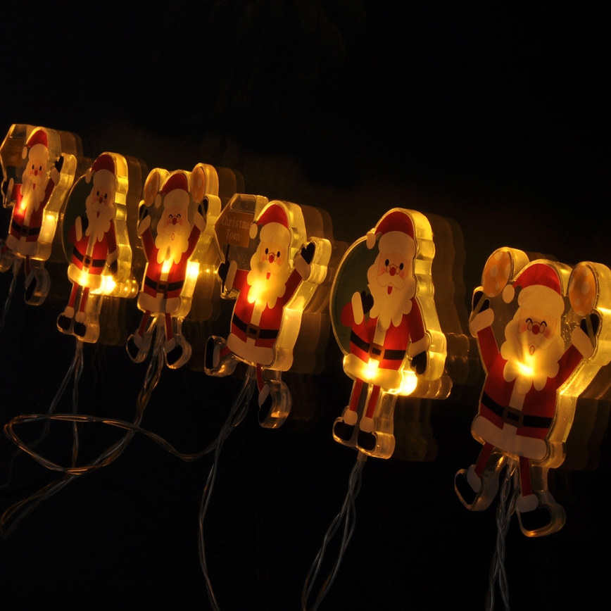 LED jouluketju imukupeilla 6xLED/2xAA 1,2m lämmin valkoinen joulupukki