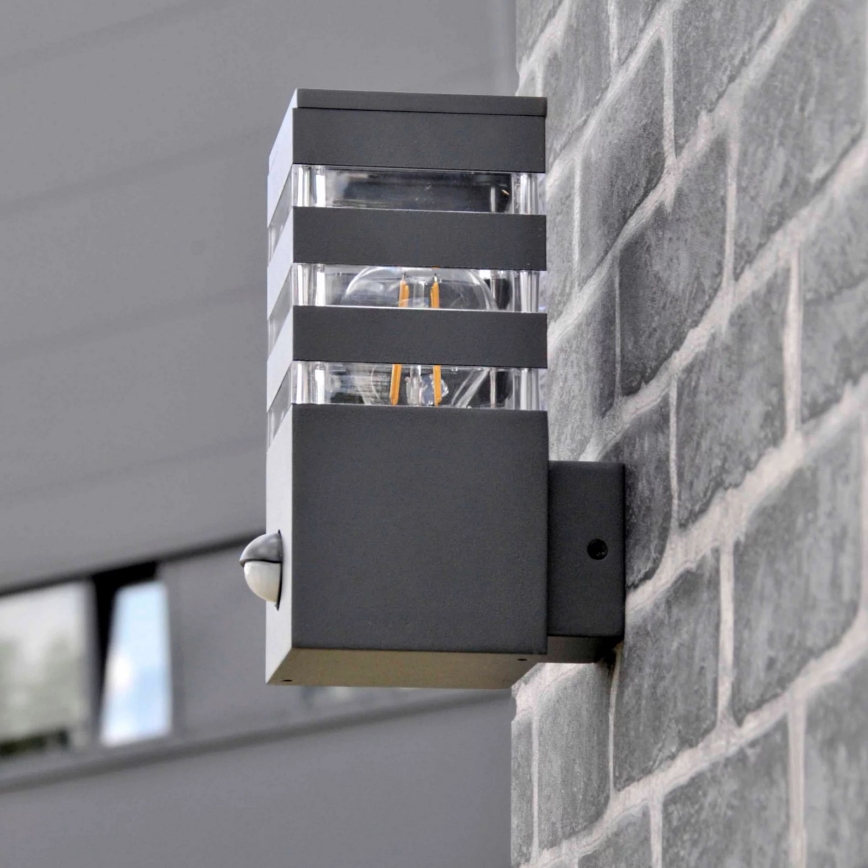 Ulkoseinävalaisin anturilla TEKSAS 1xE27/12W/230V IP44 antrasiitti