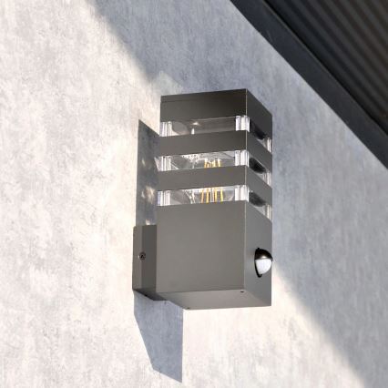 Ulkoseinävalaisin anturilla TEKSAS 1xE27/12W/230V IP44 antrasiitti