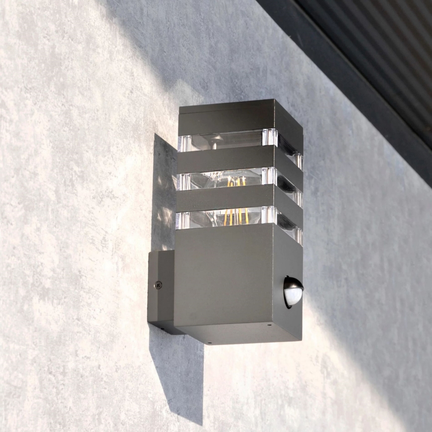 Ulkoseinävalaisin anturilla TEKSAS 1xE27/12W/230V IP44 antrasiitti