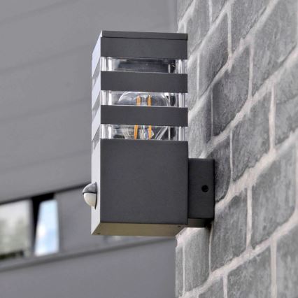 Ulkovalo anturilla TEKSAS 1xE27/12W/230V IP44 grafiitti